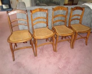 Four like chairs - One needs cane repair but the Price is Right