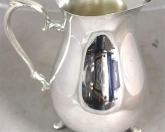 49 - Silver plated pitcher

