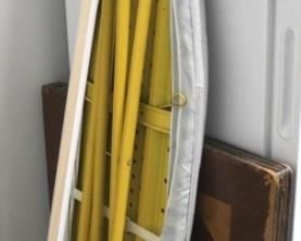 109 - Ironing board, card table, vinyl roll shade