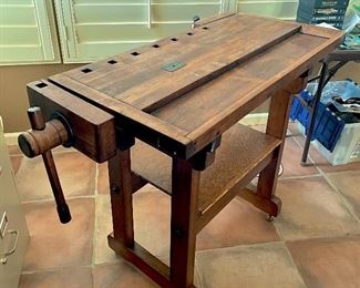 Antique workbench with wood vise