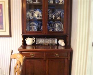 Antique cherry china cupboard from the 1860 Victorian period.