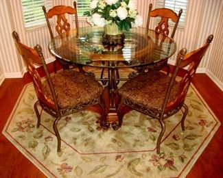 Ashley glass top table and four chairs.