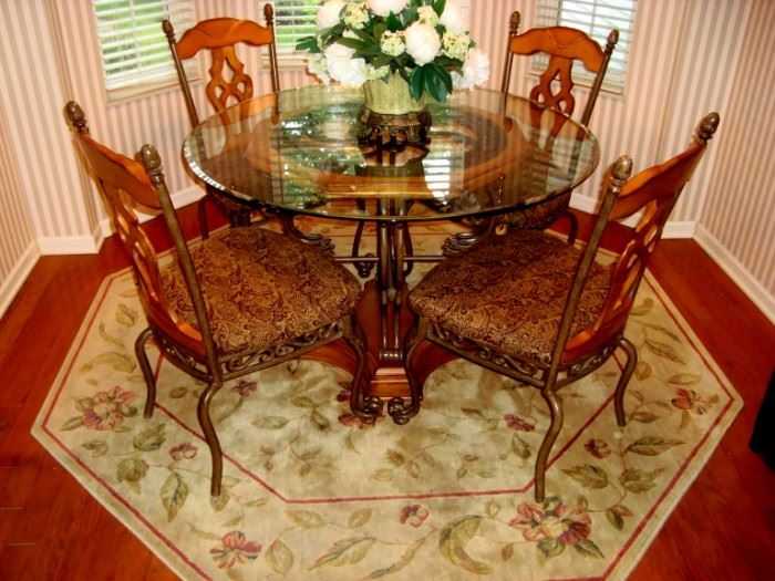 Ashley glass top table and four chairs.