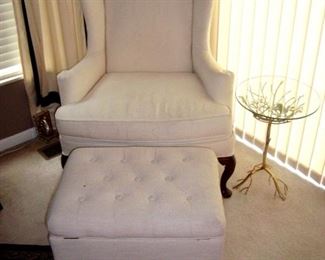 Harden white upholstered wing back chair and ottoman.