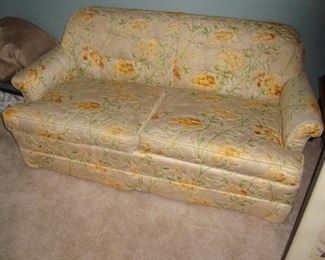 Custom upholstered love seat.