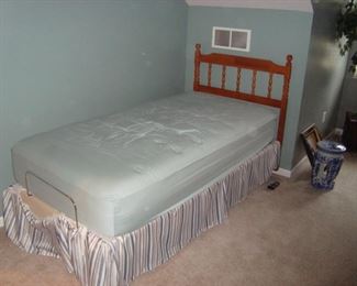 Single bed with electrically operated multi-position mattress.