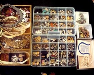 Some of the hundreds of pairs of ear rings and other jewelry items.