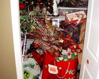 Closet stuffed full of Christmas