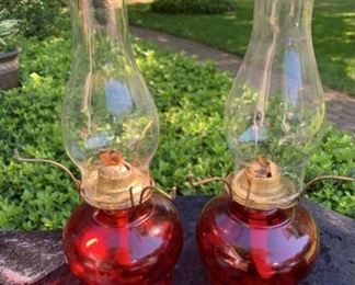 Antique red hurricane lamps