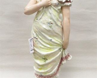 MAJOLICA PORCELAIN FIGURE OF A WOMAN 