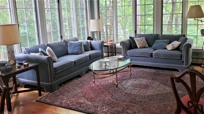 Lots of sofas, lamps, beautiful oriental rugs.