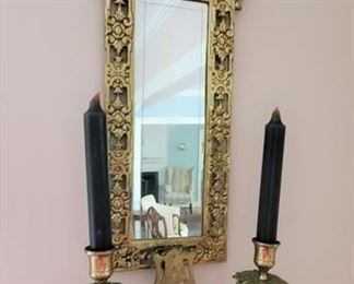 A pair of gilt brass wall sconces. One shown.