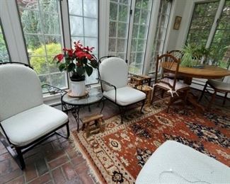 Wrought iron sunroom furniture  including a glider