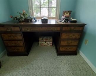 Another very similar double bank writing desk with leather surface.