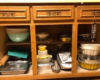  tupperware bowls, rolling pin, George Forman Grill, bundt pans, springform cake pans, jello pans, silverware holder