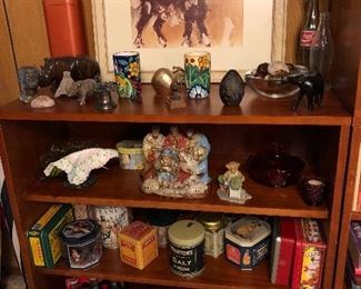 book case,  donkey picture, tins, collector coke cartons,Elvis tray, ruby glass, Christmas nativity decoration, collector Crayola Crayons african bust, african animals, Liberty bell, leaded glass bowl