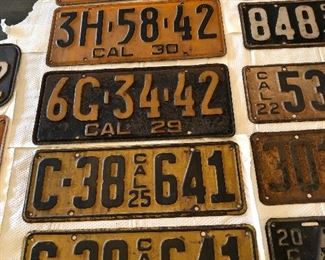 Antique car tags  all are California    14 total  starting in 1920    last one is 1945