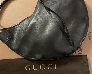 Black half moon Gucci bag from Rome 