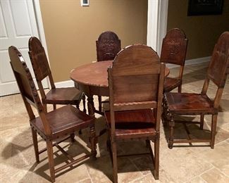 Extension table and 6 leather chairs