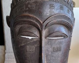 African Hand Carved Wood Tribal Mask	21x8.5x5in
