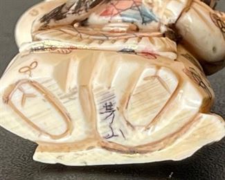 Vintage Netsuke with Rotating Face Ivory	2x1.25x1.75
