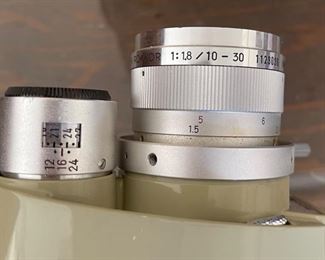 Minolta Zoom 8 8mm Chrome & Cream Film Camera in Case	Case: 9x9x3in

