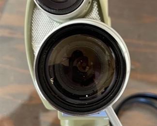 Minolta Zoom 8 8mm Chrome & Cream Film Camera in Case	Case: 9x9x3in
