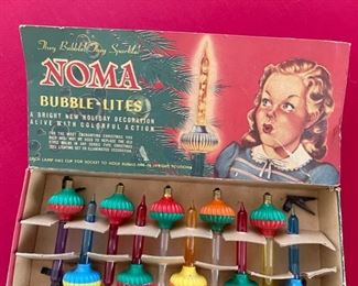 VINTAGE 1950'S SET OF 10 NOMA BUBBLE LITES CHRISTMAS TREE LIGHTS WITH BOX	N/A
