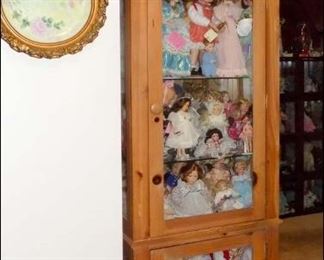 Curio with Collectible Porcelain Dolls
