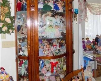 Large Curio with Collectible Porcelain Dolls
