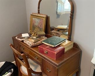 . . . this is a burl vintage vanity with chair with Queen Ann legs