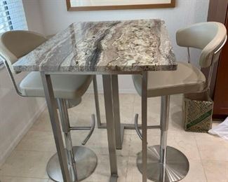 Scan Design granite bar table and leather stools with brushed stainless  metal.