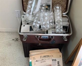 Vintage newspapers & plastic kitchenware