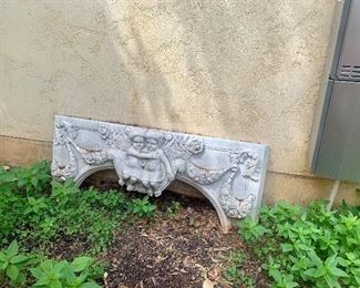Decorative marble with cherubs (possibly a mantle piece?)