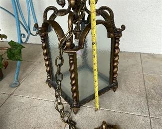 c.1920s cast bronze ceiling light.  $600.00  The chain and ceiling hook all bronze and original period.   Seed glass panels all sides including the bottom.   This is a beautiful piece.  