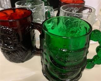 Vintage colored glass Santa mugs