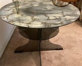 Funky 1980s glass pedestal coffee table with veined top.