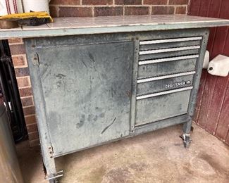 Tile topped, wheeled outdoor patio cabinet with drawers