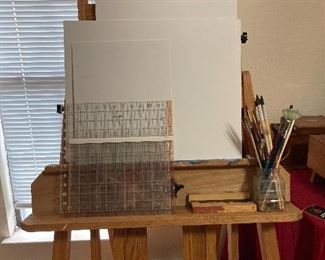 Four-legged artist easel with dual adjustable top canvas holder
