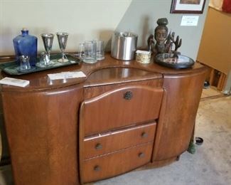 Art Deco buffet with mirrored bar inside.