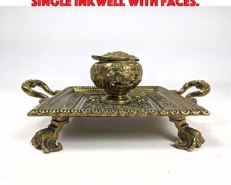 Lot 12 Fancy Brass Footed Inkwell. Single inkwell with faces.