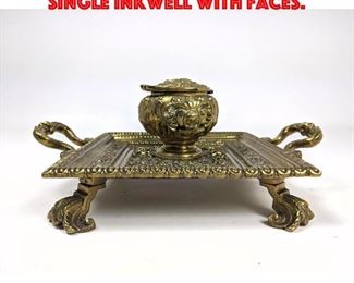 Lot 12 Fancy Brass Footed Inkwell. Single inkwell with faces. 