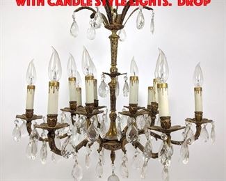 Lot 275 Fancy Metal Chandelier with Candle style Lights. Drop 