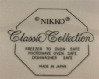 $295 Nikko "Christmastime" Serving Set included with the place setting for 16