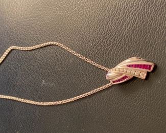 $375 - 14kt white gold chain pendant with rubies and diamonds 0.340 oz gold 