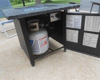(#75-A) Firepit with an almost full tank $50