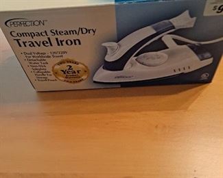 OK, so if I am going to travel, I am sure as heck not gonna iron.  Plus it would get in the way of my drinking.