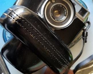 ***SOLD!!***  VINTAGE Minolta Autopak 700 camera. Uses 126 film cartridges. Includes black leather case.