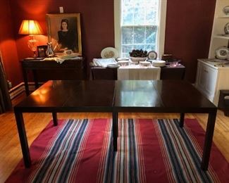 Dunbar dining table. Different view and rug,  sans tableware. 2 rugs available, but in Game room now.