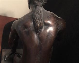Back of bronze nude